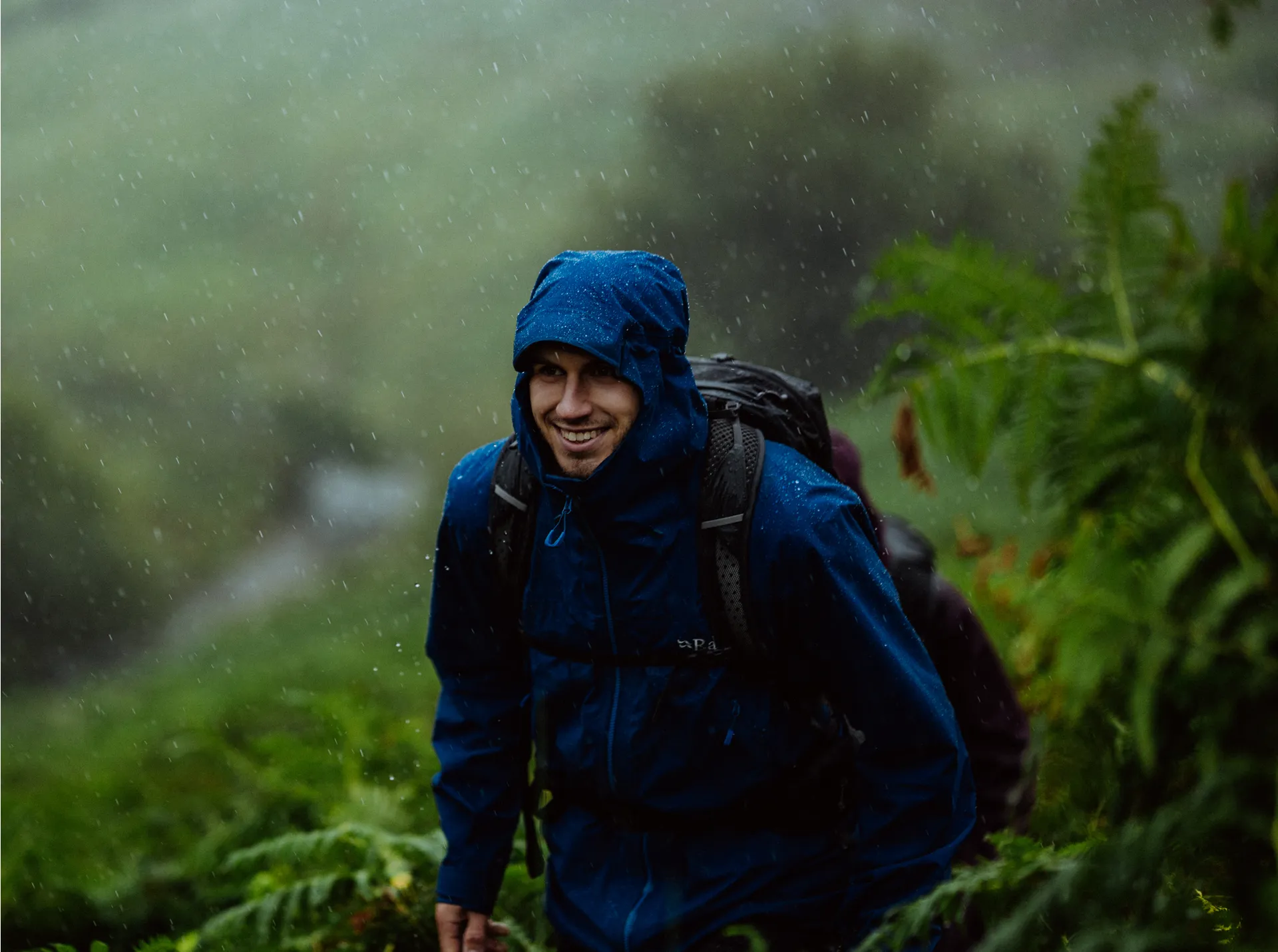 Close-up of an adjustable hiking jacket hood and peak