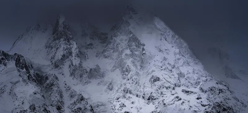 Devold scrambling on rocks