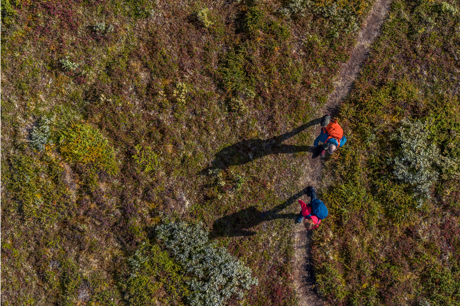 Tierra hiking in rugged terrain